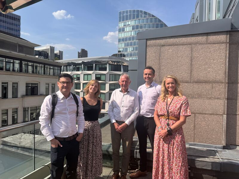 Team members on a rooftop terrace during the visit to Littlepay